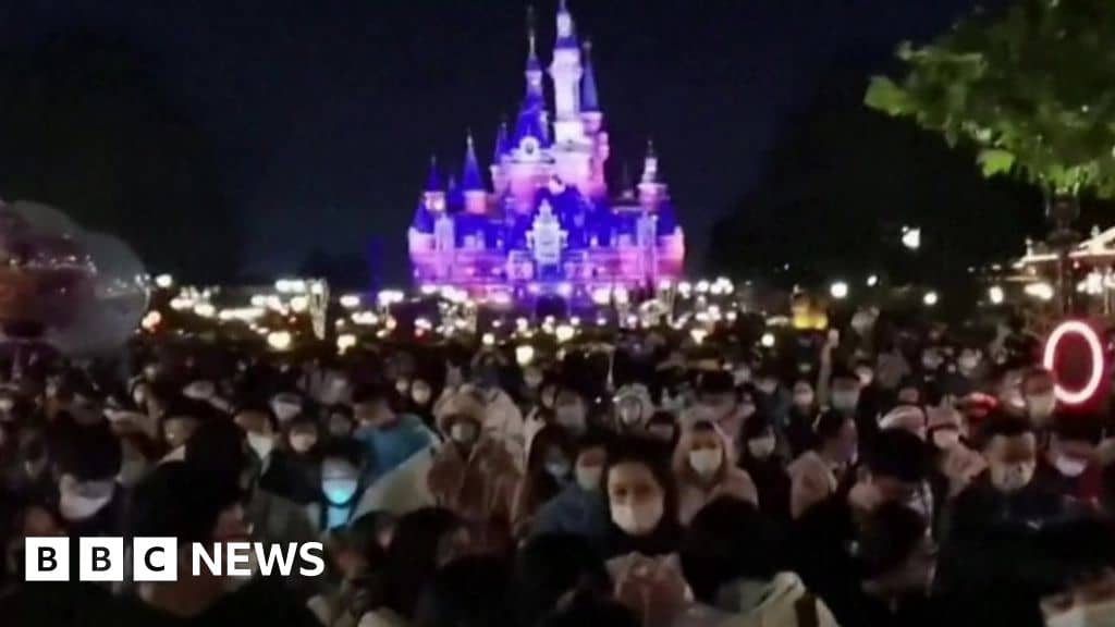 Shanghai Disney: Video shows crowds trapped in Covid lockdown at theme park