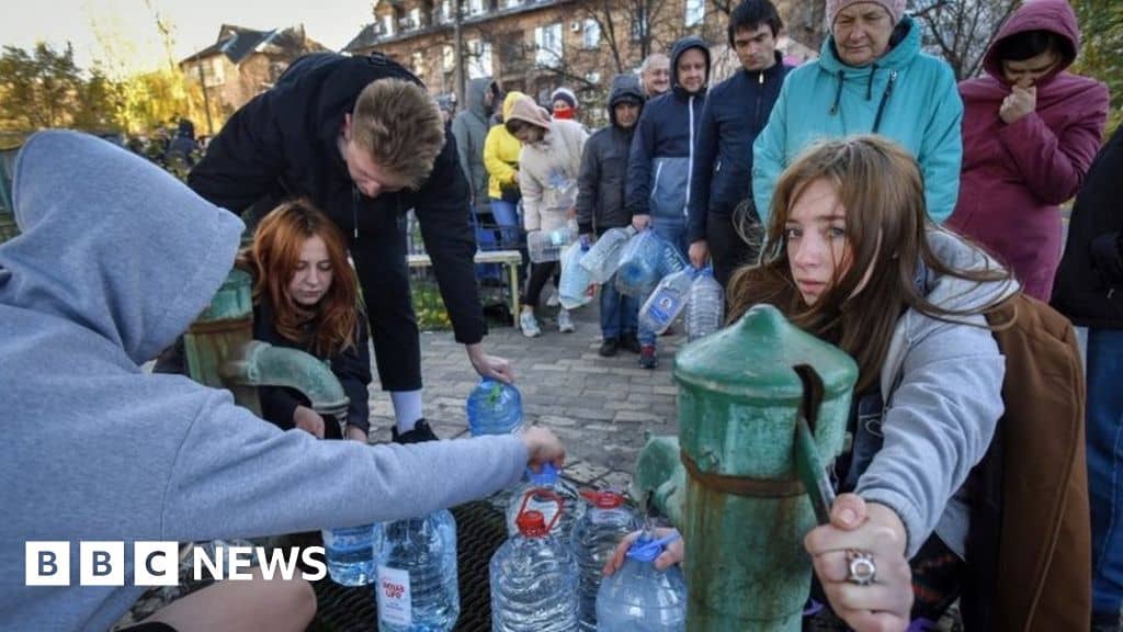 Ukraine war: Kyiv locals queue for water after Russian strikes